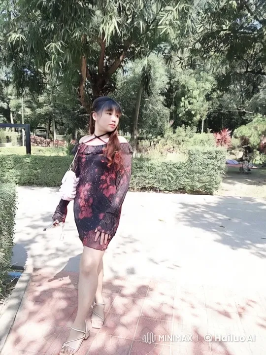 Woman in Elegant Dress in Serene Park Setting – AI Generated Video | Hailuo AI