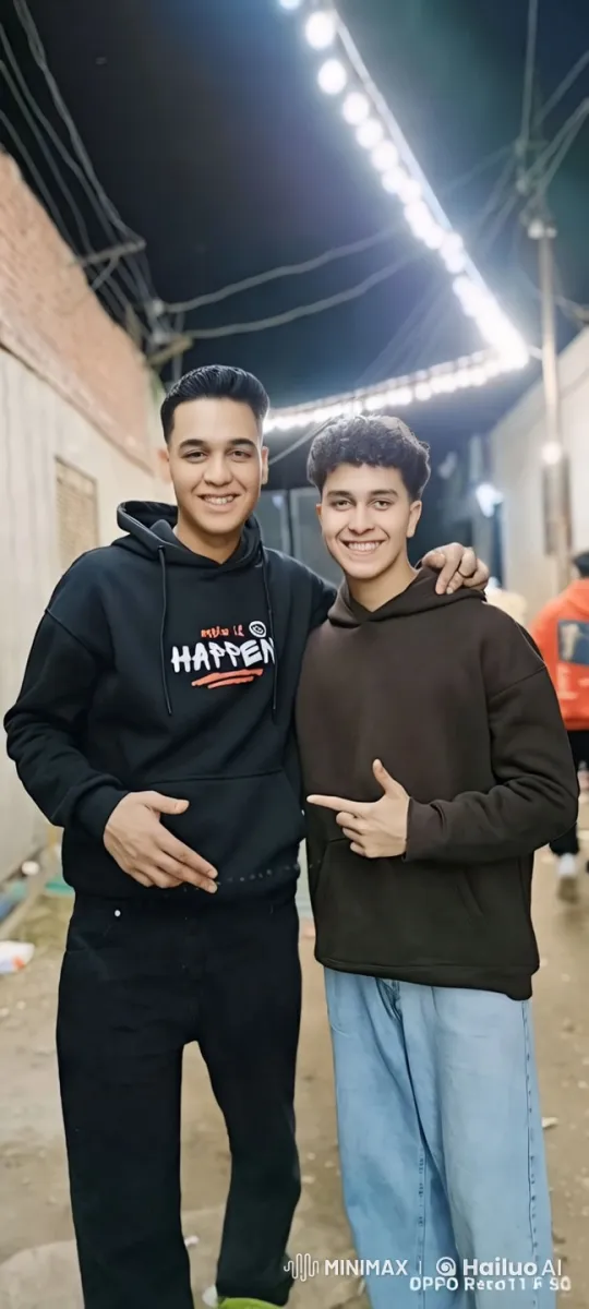 Tense Confrontation in Dim Alleyway Between Two Young Men – AI Generated Video | Hailuo AI