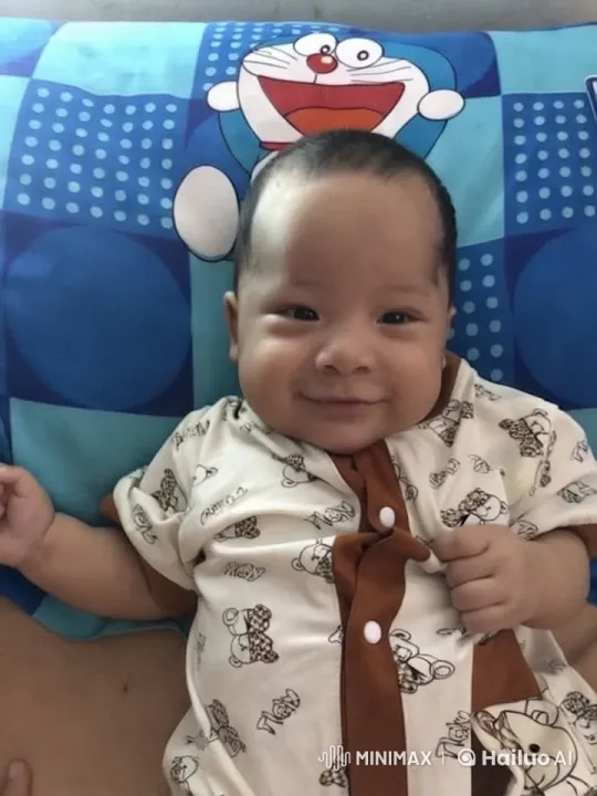 Baby Dancing and Playfully Puncting on Bed – AI Generated Video | Hailuo AI