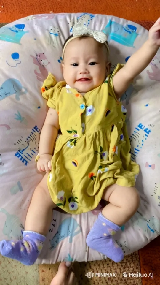 Baby Dancing Joyfully on Colorful Cushion – AI Generated Video | Hailuo AI