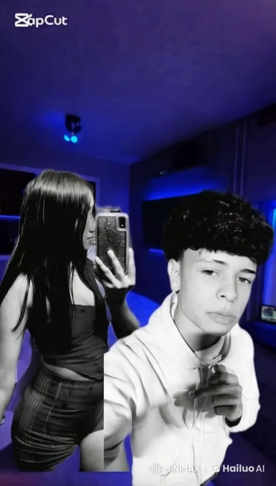 Romantic Moment Captured in Blue-Lit Room – AI Generated Video | Hailuo AI