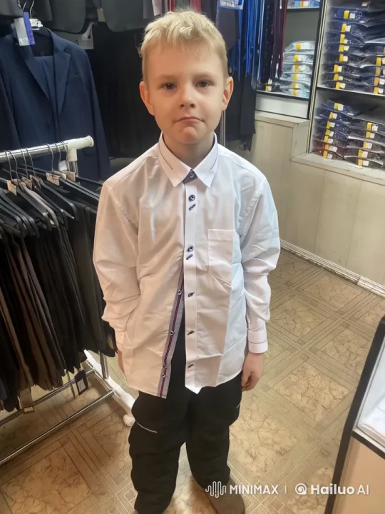 Young Boy Showcases Attire in Elegant Clothing Store – AI Generated Video | Hailuo AI