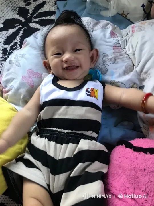 Baby's Joyful Dance and Play on Bed – AI Generated Video | Hailuo AI