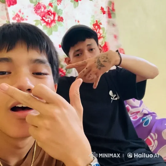 Vibrant Room with Two Individuals Making Hand Gestures – AI Generated Video | Hailuo AI