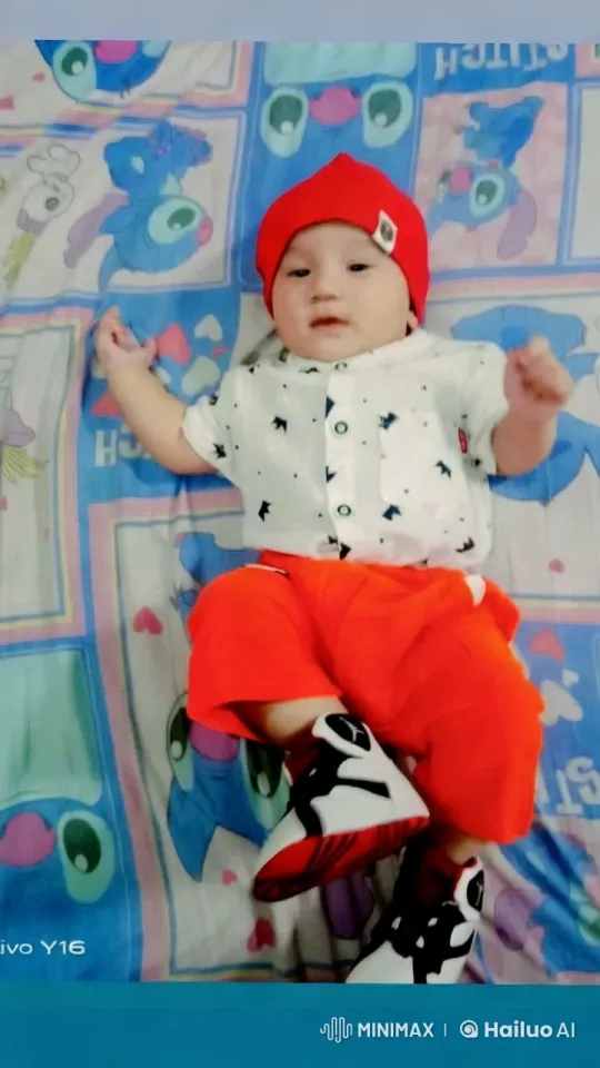 Baby Dances Cheerfully on Colorful Bedspread – AI Generated Video | Hailuo AI