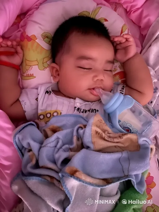 Baby Dancing Playfully on Soft Blanket in Cozy Surroundings – AI Generated Video | Hailuo AI