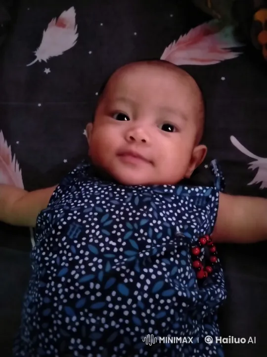 Baby on Starry Feathers Blanket in Serene Setting – AI Generated Video | Hailuo AI