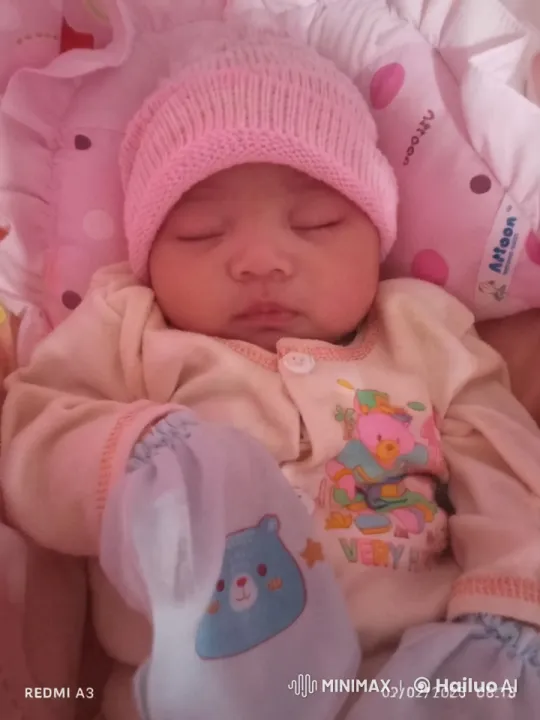 Baby Resting Comfortably in Cozy, Colorful Outfit – AI Generated Video | Hailuo AI
