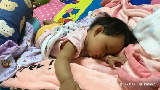 Baby's Joyful Dance in a Colorful Bed Setting – AI Generated Video | Hailuo AI