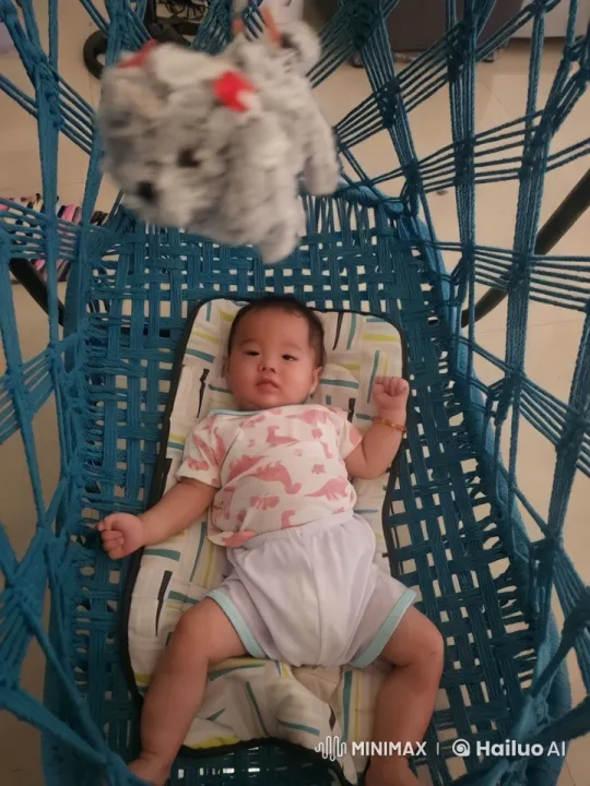 Baby's Playful Dance and Kung Fu Moves in Hammock – AI Generated Video | Hailuo AI