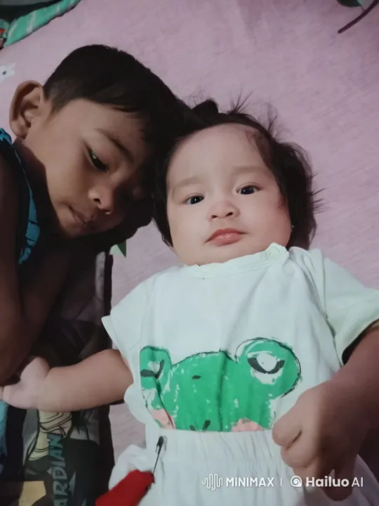 Child's Joyful Dance and Playful Kungfu on Bed – AI Generated Video | Hailuo AI