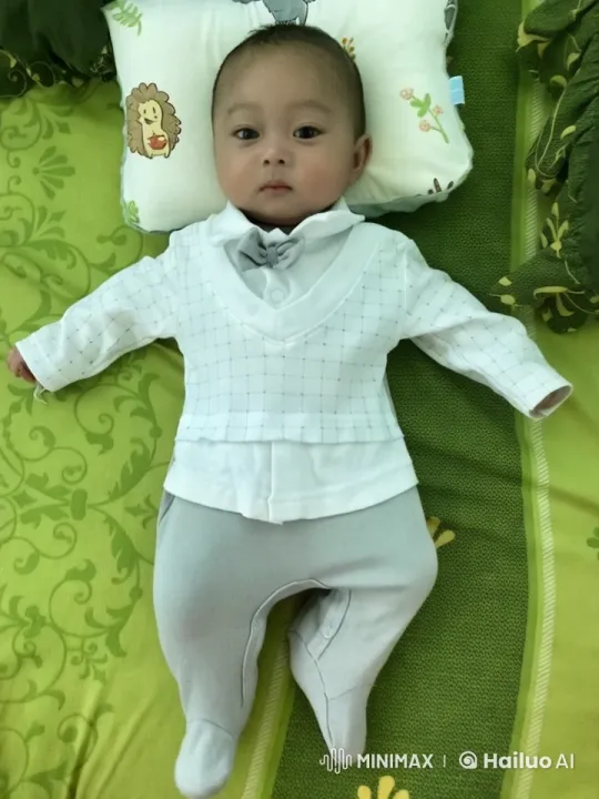 Baby's Joyful Dance on Patterned Bed – AI Generated Video | Hailuo AI