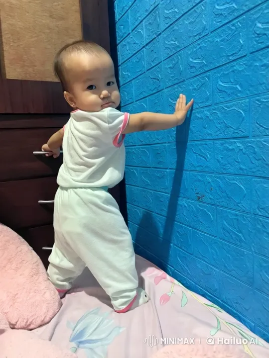 Baby Dancing Playfully on Bed with Joyful Rhythms – AI Generated Video | Hailuo AI