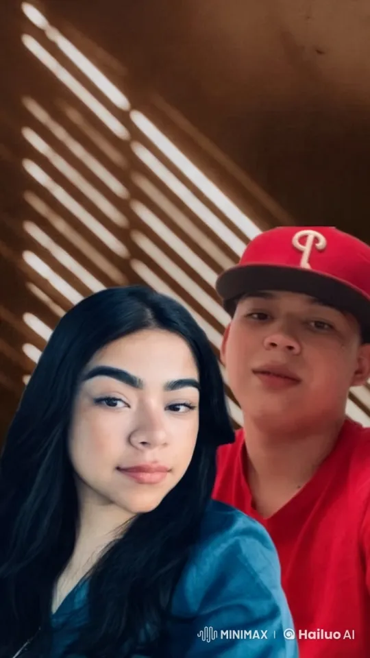 Boy Kisses Girl on Cheek in Warmly Lit Scene – AI Generated Video | Hailuo AI