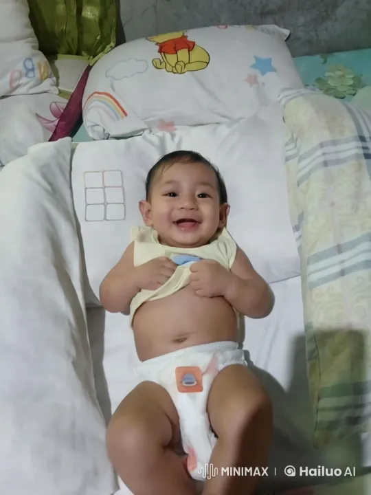 Baby's Playful Boxing and Dancing Routine on Bed – AI Generated Video | Hailuo AI