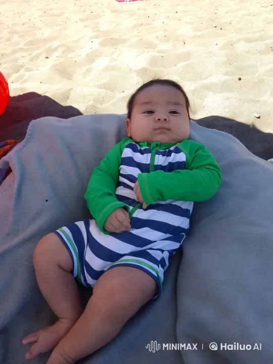 Baby's Joyful Dance and Playful Kungfu Moves on Beach – AI Generated Video | Hailuo AI