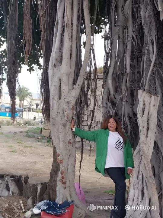 Woman Dances Gracefully by Majestic Ancient Tree – AI Generated Video | Hailuo AI