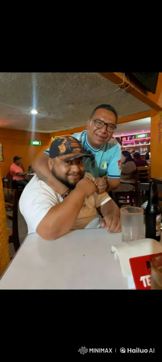 Intimate Moment in a Bustling Restaurant – AI Generated Video | Hailuo AI
