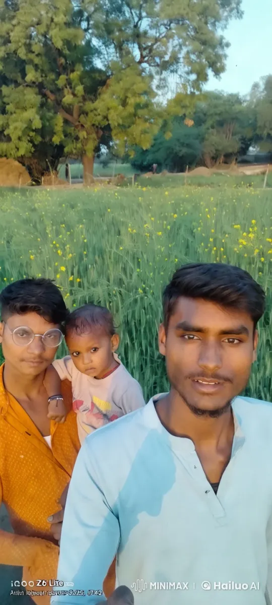 Lush Green Field with Individuals in Blue and Orange Shirts – AI Generated Video | Hailuo AI