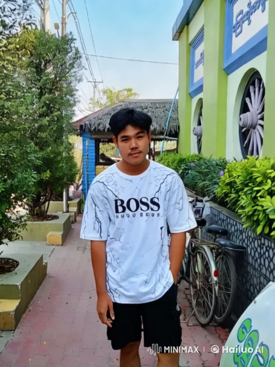 Young Man on Pathway in Serene Landscape – AI Generated Video | Hailuo AI