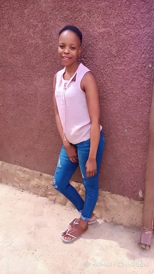 Young Woman in Casual Outfit on Rustic Background – AI Generated Video | Hailuo AI