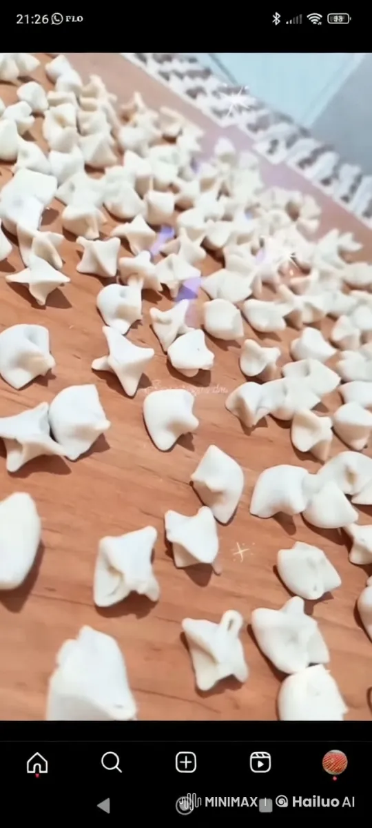 Miniature Women Craft Giant Dumplings with Passion – AI Generated Video | Hailuo AI
