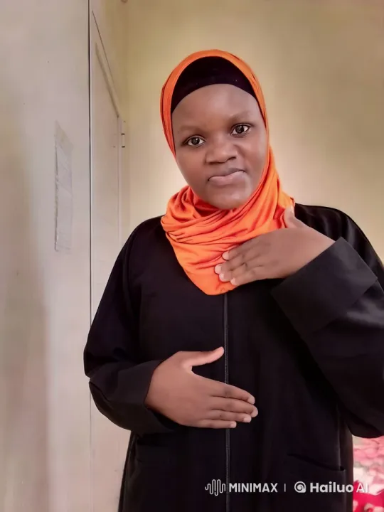 Vibrant Portrait of a Person in an Orange Headscarf – AI Generated Video | Hailuo AI