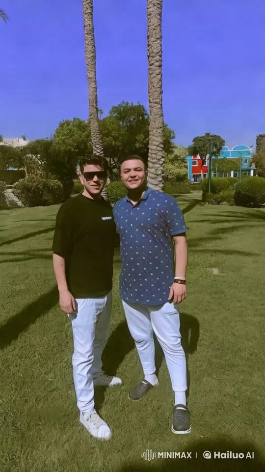 Two Men Dance Energetically in Serene Garden Setting – AI Generated Video | Hailuo AI