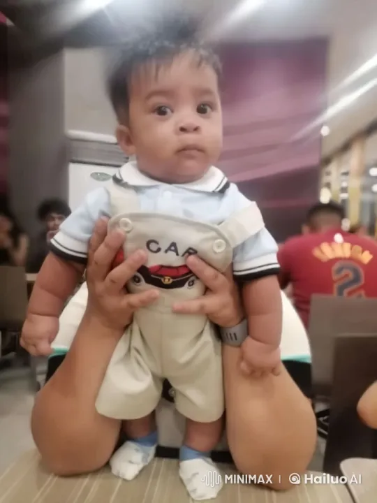Baby's Playful Kungfu Dance in Colorful Setting – AI Generated Video | Hailuo AI