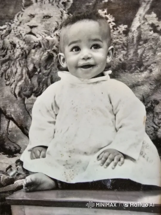 Sepia to Vibrant: Animated Baby's Delicate Smile – AI Generated Video | Hailuo AI