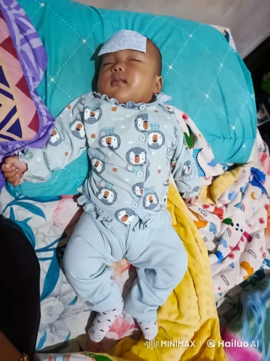 Baby Dancing in Colorful Outfit on Bed – AI Generated Video | Hailuo AI