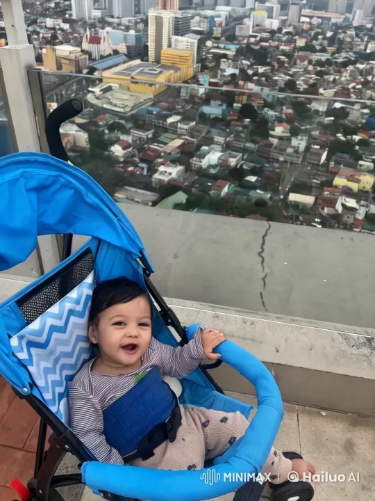 Cityscape Serenity: Baby in Rooftop Stroller – AI Generated Video | Hailuo AI