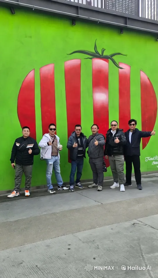 Kungfu Performers Showcase Skills Against Tomato Mural – AI Generated Video | Hailuo AI