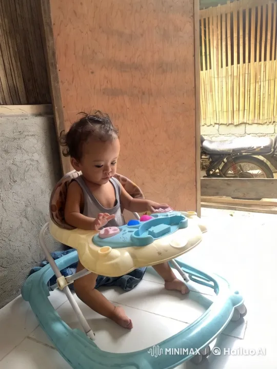 Child Playing in Baby Walker with Toy – AI Generated Video | Hailuo AI