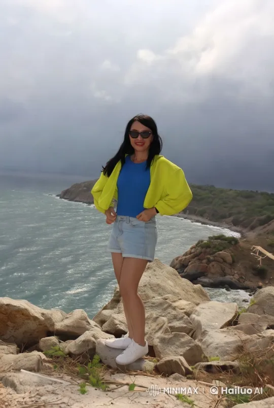 Woman in Yellow Stands Out Against Ocean Horizon – AI Generated Video | Hailuo AI