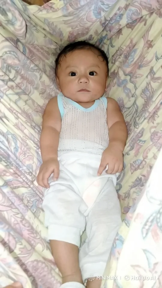 Peaceful Moment: Baby in Swinging Hammock – AI Generated Video | Hailuo AI