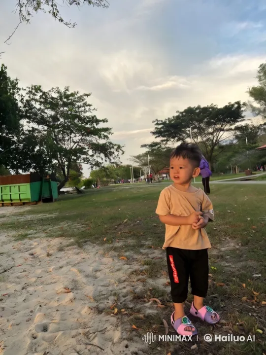 Child Combines Playful Dance and Kungfu in Park Setting – AI Generated Video | Hailuo AI