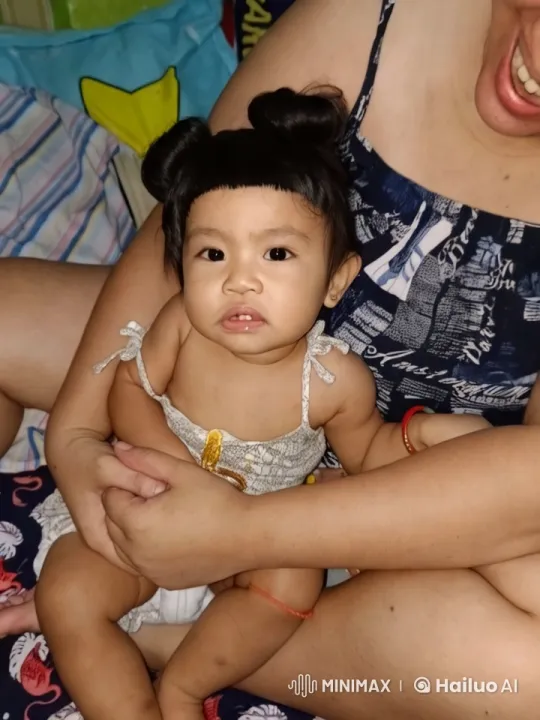 Baby's Joyful Kung Fu Dance on Adult's Lap – AI Generated Video | Hailuo AI