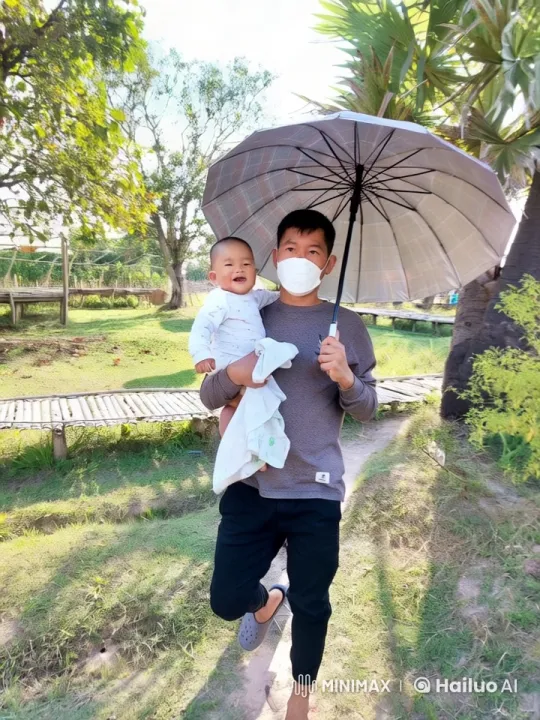 Kungfu Master Performs with Baby in Lush Garden – AI Generated Video | Hailuo AI