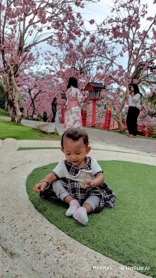 Baby's Joyful Dance Amid Cherry Blossoms – AI Generated Video | Hailuo AI