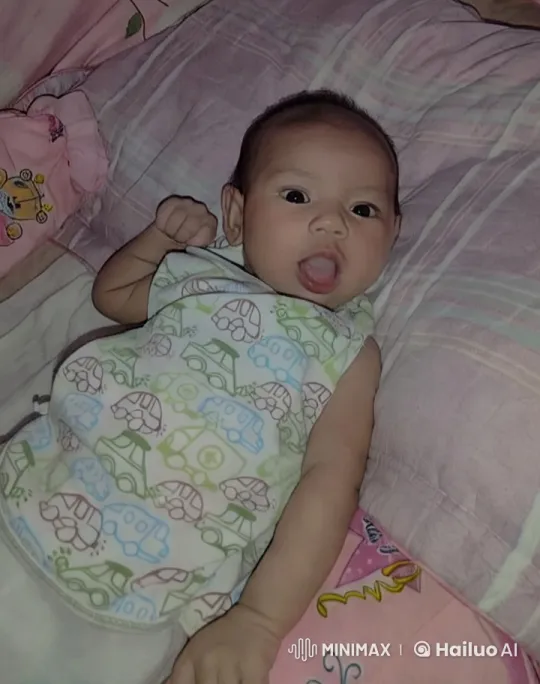 Baby on Cozy Bed in Colorful Onesie – AI Generated Video | Hailuo AI