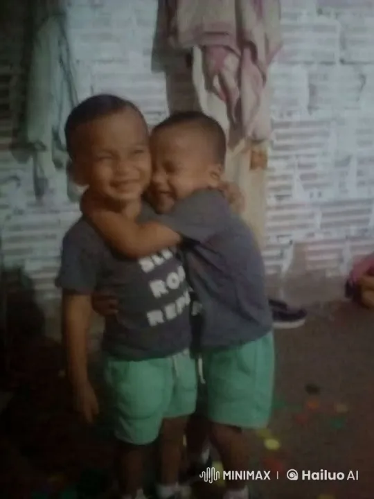 Boys' Playful Tussle Captured in Artistic Video – AI Generated Video | Hailuo AI