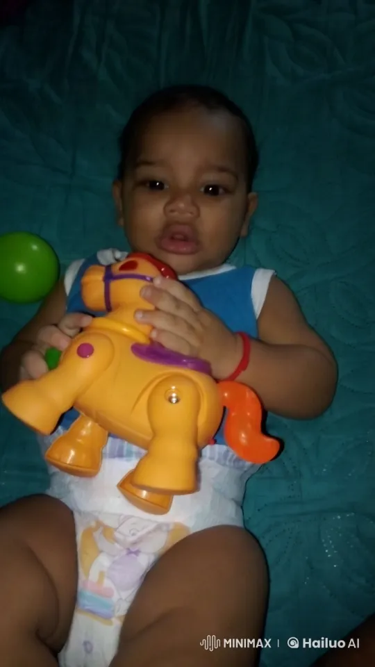 Baby Dancing Joyfully on Colorful Blanket – AI Generated Video | Hailuo AI