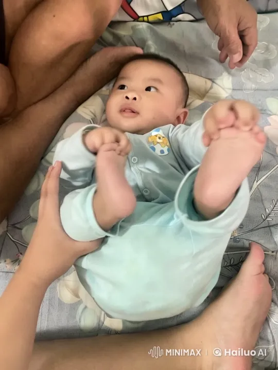 Baby Dancing Playfully with Adult Assistance – AI Generated Video | Hailuo AI