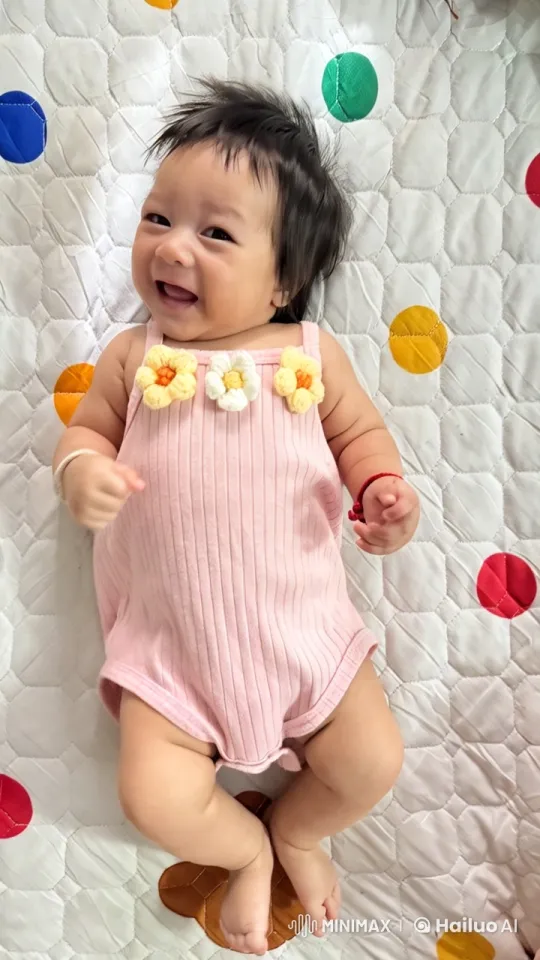 Baby Dancing with Joy on Colorful Quilt – AI Generated Video | Hailuo AI