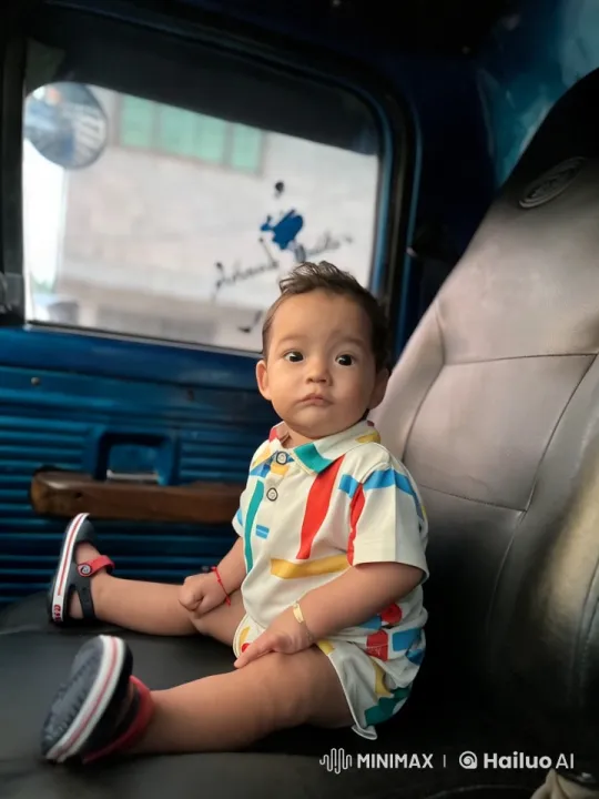 Baby's Joyful Play in a Blue Vehicle – AI Generated Video | Hailuo AI