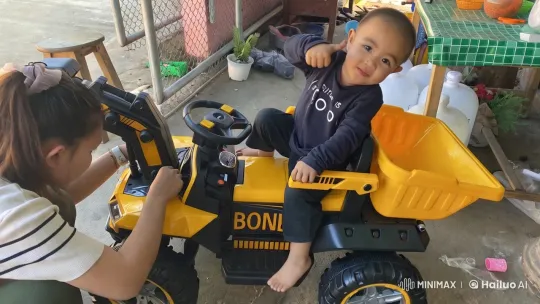 Energetic Child Dancing and Punching on Toy Truck – AI Generated Video | Hailuo AI