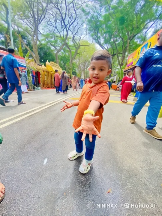 Child's Energetic Dance and Kung Fu Moves in Festive Street Setting – AI Generated Video | Hailuo AI