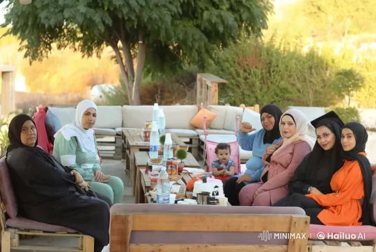 Women Chatting Outdoors Amidst Nature and Comfort – AI Generated Video | Hailuo AI
