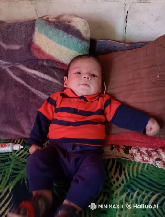 Baby's Joyful Dance on Colorful Bed – AI Generated Video | Hailuo AI